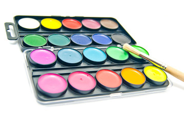 Watercolors and wooden brush