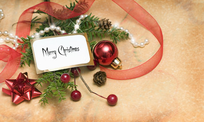 Christmas background with branch, decoration and blank note