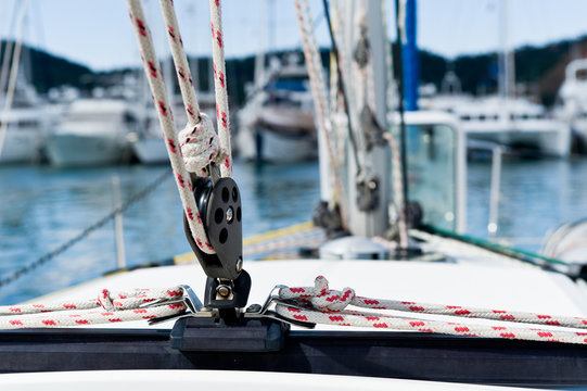 Fototapeta Sailing yacht rigging equipment main sheet traveller