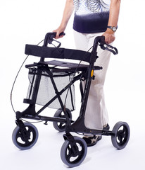 elderly woman with walker for disabled, lower bodypart