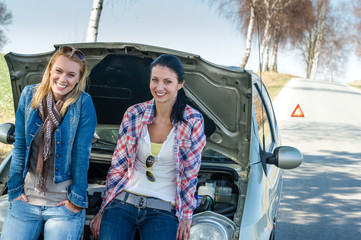 Car defect two women waiting for help