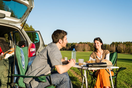 Camping car young couple enjoy picnic countryside