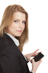 junge blonde Frau business look mit smartphone