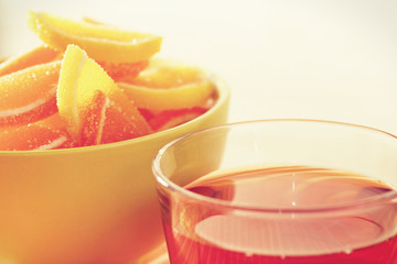 Cup of tea and fruit jelly still life