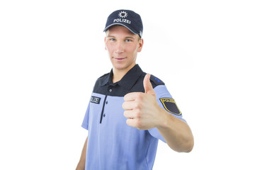 Polizei in Uniform zeigt daumen hoch