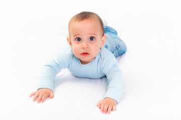 Fototapeta premium Little Child on the Bed