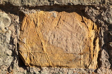 Yellow stained brick stone