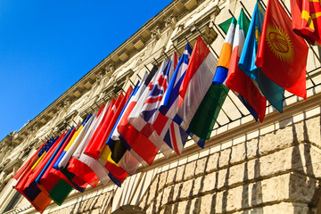 Obraz premium Vienna, Austria - international set of flags on Hofburg palace