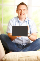 Man showing tablet