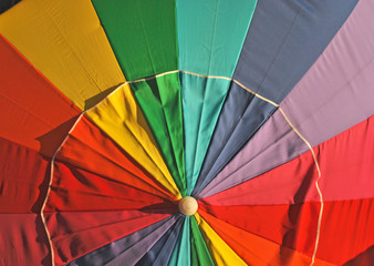 Fototapeta premium A close up of a colorful umbrella at Clearwater beach in Florida
