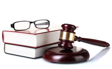 wooden gavel, glasses and books isolated on white