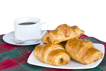 Breakfast with a cup of black coffee and croissants, Shallow DOF