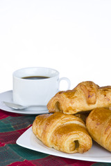 Breakfast with a cup of black coffee and croissants, Shallow DOF