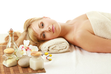 Obraz na płótnie Canvas Young blonde woman at spa procedure