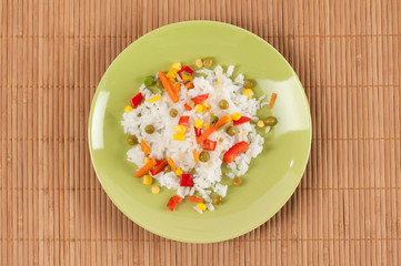 rice with peas, corn,  and red peppers