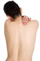 Young woman with pain in her back