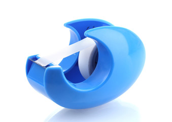 scotch tape in blue holder isolated on white.