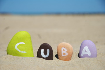 Cuba, word on colourful pebbles