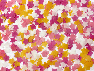 The background of pink, yellow and white stars