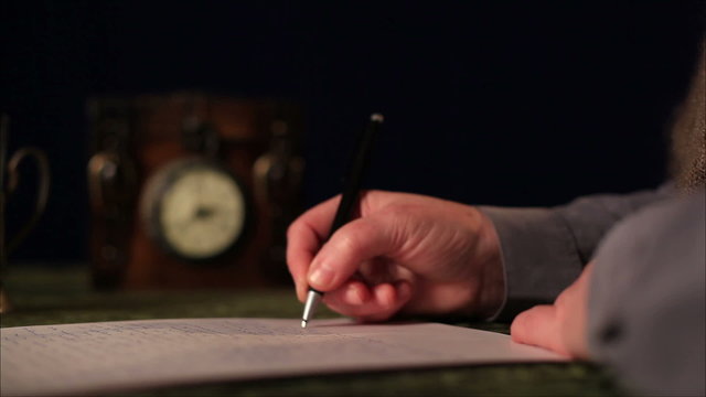 woman writes a letter