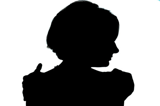 Silhouette of profile of woman embracing herself, as logo