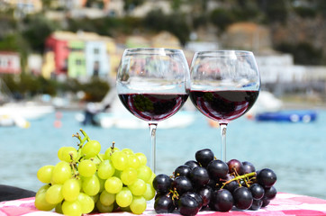 Pair of wineglasses and grapes. Portvenere, Italy