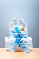 Cakes made of diapers on white