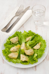 salad artichoke with lettuce on the plate