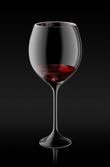Glass of red wine on black background