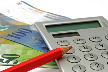 taschenrechner mit auto und schweizerfranken