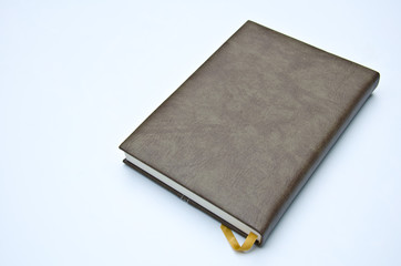 brown leather notebook