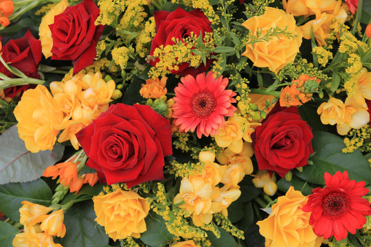 yellow and red flower arrangement