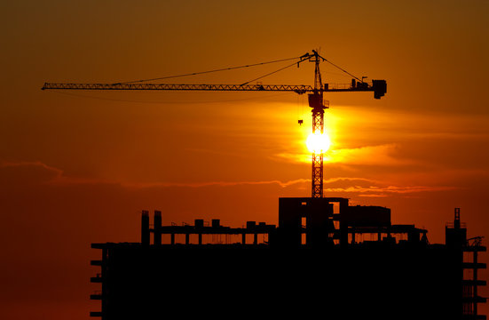 Construction site as sunset