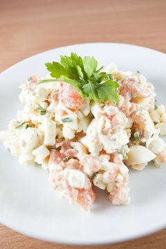 Fresh salad made of salmon peaces, eggs and herbs - Ducan diet