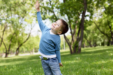 Portrait of a little boy outdoors