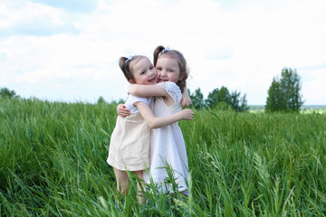 two little sisters outdoors