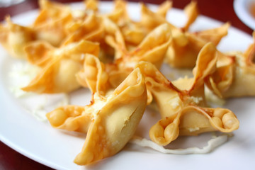 Plate of crab puffs at a Chinese restaurant.