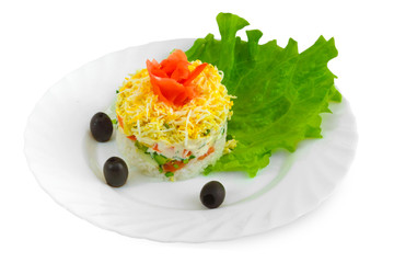 fresh salad with olives, rice, egg cucumbers and tomatoes on whi