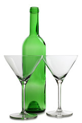 Empty green bottle and glasses