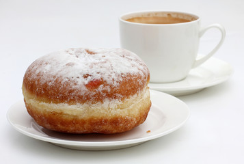Pastry and coffee cup