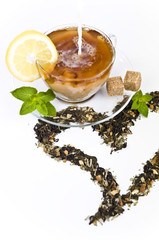 Cup of tea with milk and heart