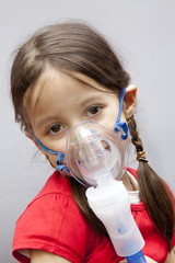 little girl with nebulizer
