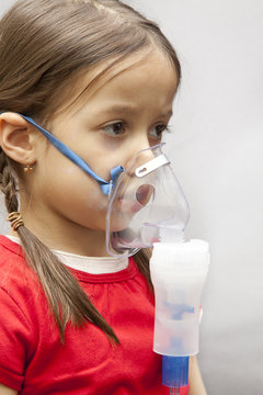 little girl with nebulizer