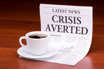 The newspaper LATEST NEWS.with the headline CRISIS AVERTED