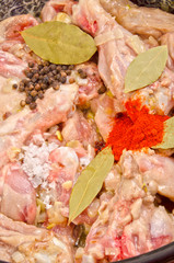 chicken thighs with pepper, salt and bay leaf