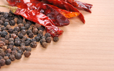 Peppers on wooden board