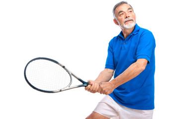 senior man playing tennis