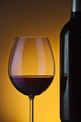 Glass and bottle of wine