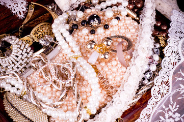 Golden jewelry background with lace