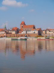 Panoramic view of old town of Torun, Poland across Wisla river